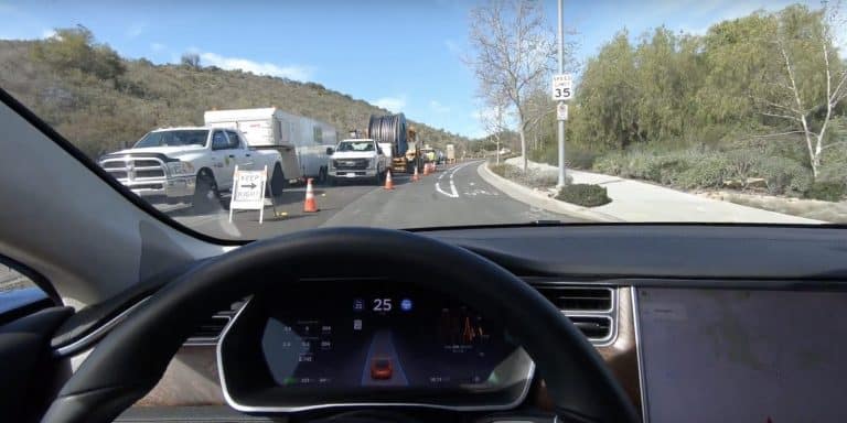 Tesla Autopilot avoids construction zone with automatic lane change