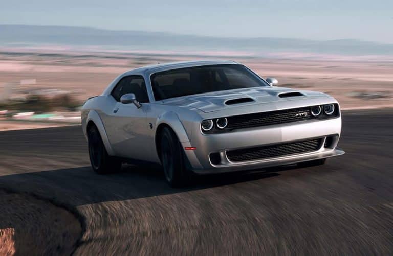 Watch a Dodge Hellcat Redeye versus Tesla Model S Performance