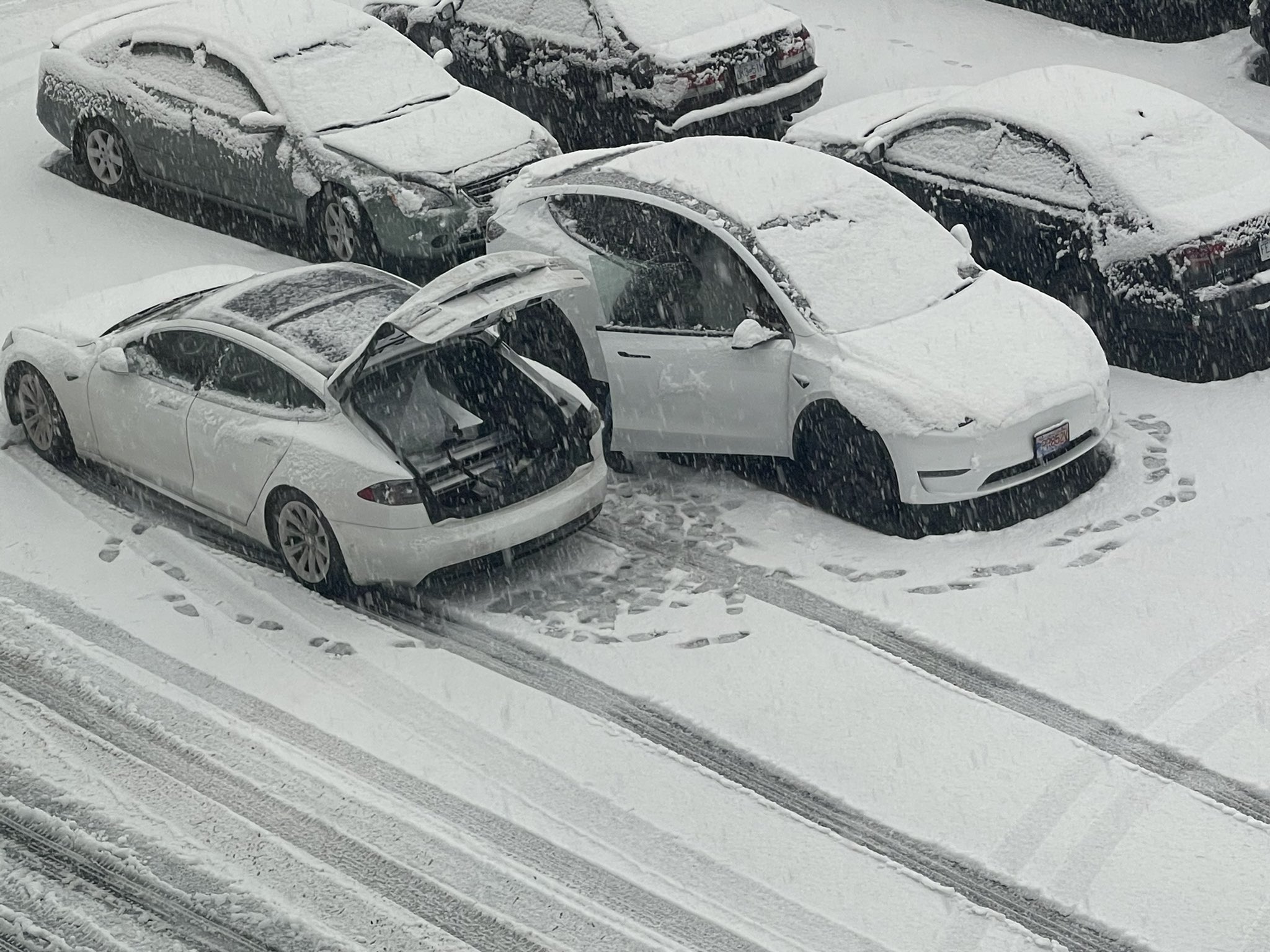 Tesla mobile technician dedicated to service during holiday snow storm