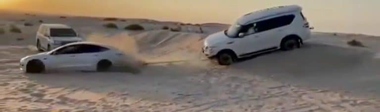 Tesla Model 3 pulls SUV from trouble in the sands of Dubai