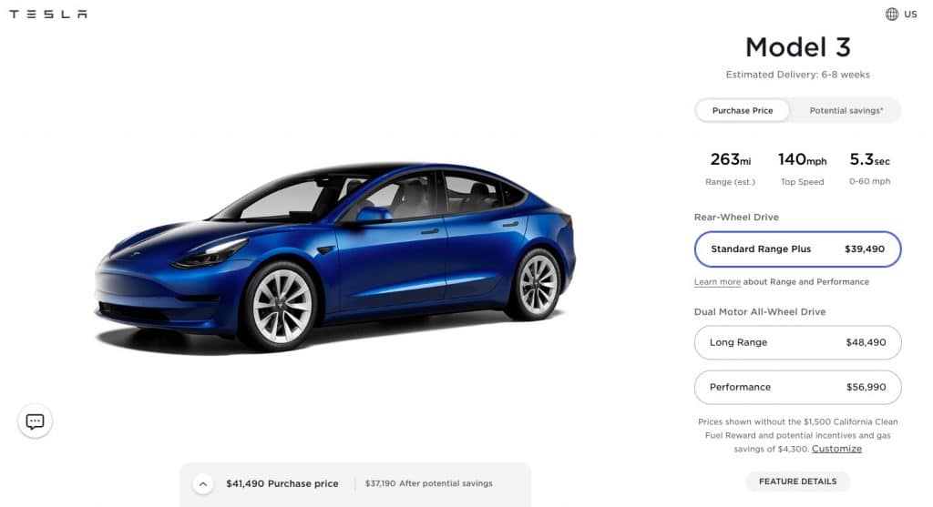 A Tesla Model 3 in front of a white background
