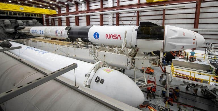 SpaceX Dragon, Falcon 9 rocket roll out to pad for first launch in six weeks
