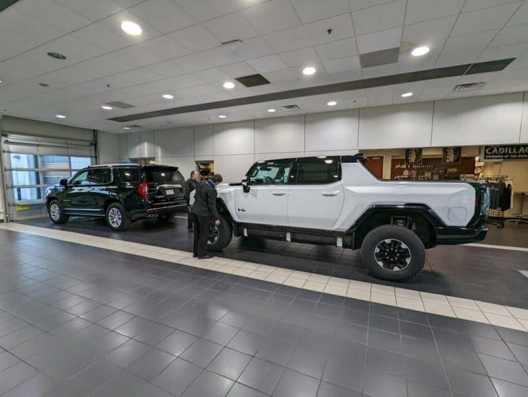 GMC Hummer EV sports its massive size alongside full-size SUV