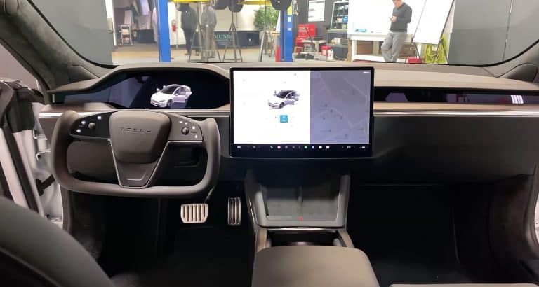 Tesla Model S Plaid interior analysis explains how the steering yoke increases safety