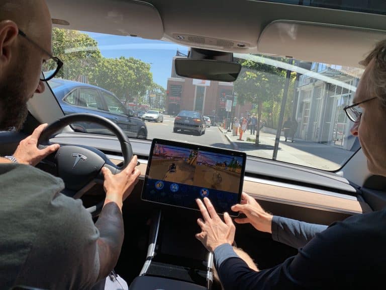 Tesla submits partial response to NHTSA’s probe on in-car “Passenger Play” feature