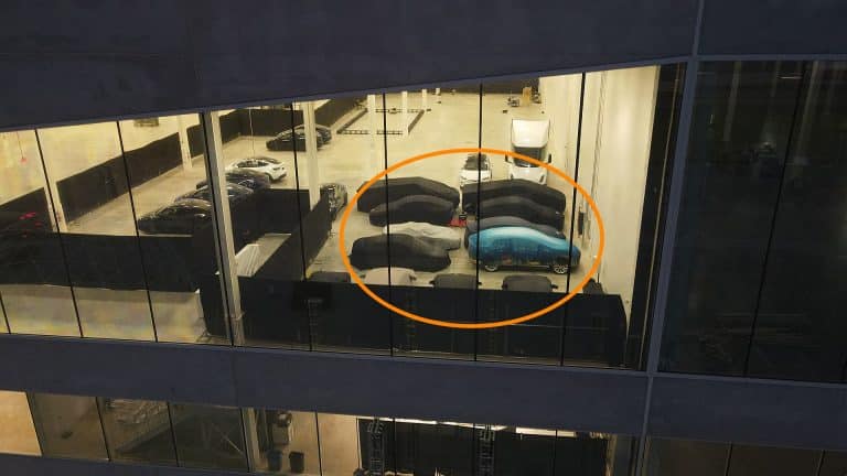 Tesla builds anticipation for ‘Cyber Rodeo’ with concealed vehicles spotted inside Giga Texas