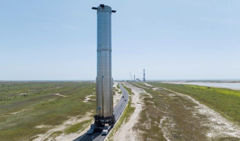 SpaceX installs Super Heavy booster on launch mount with giant robot arms