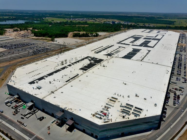 Tesla’s self-inscription atop Gigafactory Texas with solar panels continues