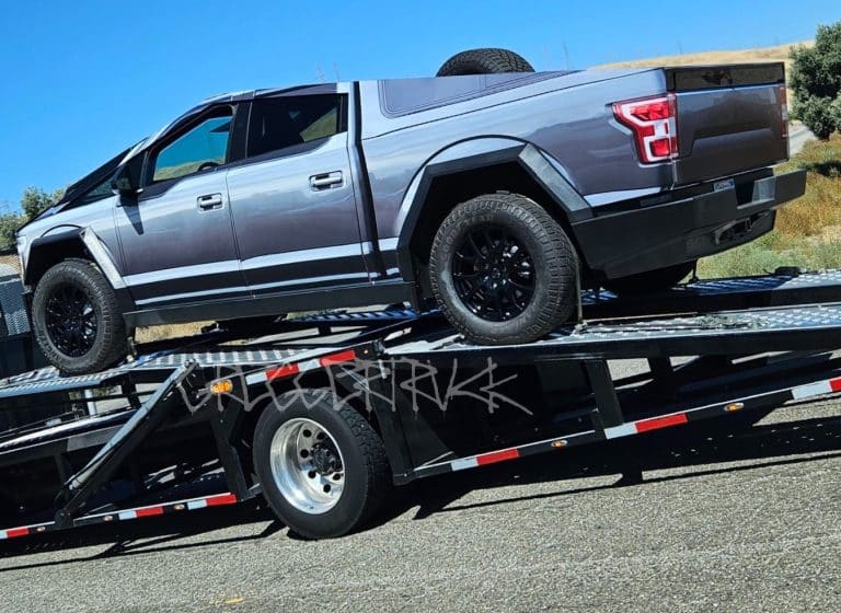 Tesla teases Ford with Cybertruck dressed as F-150 on the roads