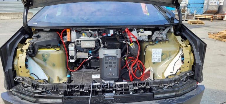 Close-up shots of the Tesla Cybertruck Dual Motor reveal details like the “Super Manifold V2,” a robust wiper motor, and intriguing interior elements