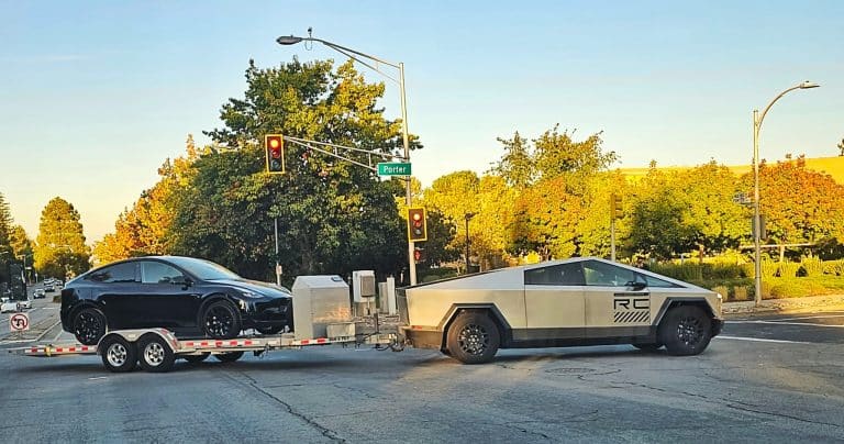 Tesla Cybertruck seen towing a Model Y on a trailer in California