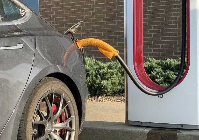 Tesla Warns Against Using Wet Cloths on Superchargers: Risks and Reactions