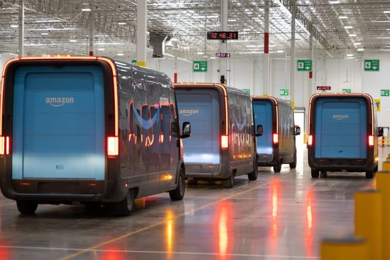 Navigating Challenges and Opportunities: Rivian’s Journey Amidst Production Pauses and Strategic Partnerships