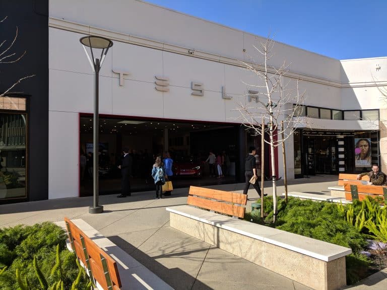 Navigating the Roadblocks: How Tesla and Rivian Tackle State Restrictions on Direct Vehicle Sales