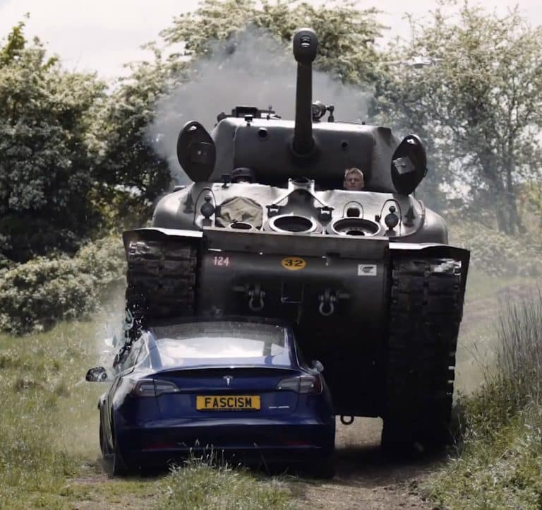 Model 3 Meets a Tank: Anti-Elon Group’s Stunt Takes an Unforeseen Turn